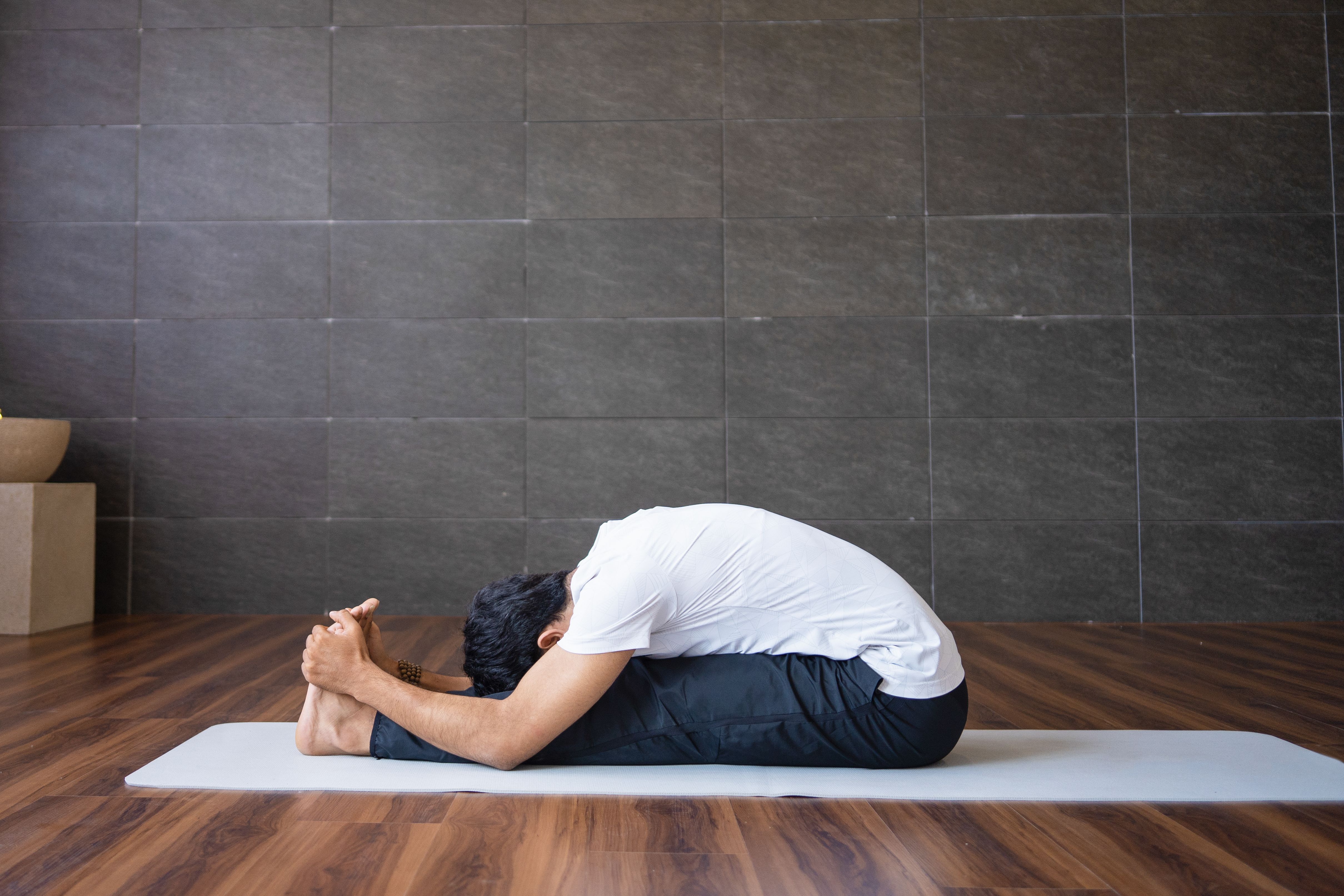 5 (41).jpg Paschimottanasana (Forward Fold Pose)