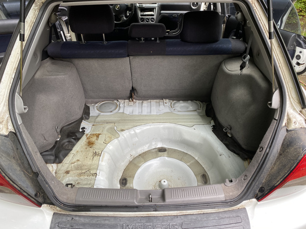 Dirty trunk of 2003 Subaru WRX Wagon