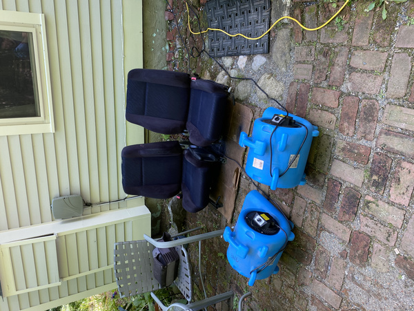 Blowers drying steam cleaned 2003 Subaru WRX front seats