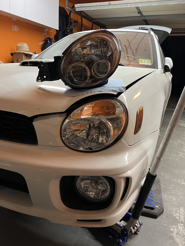 JDM Project HID headlight above stock USDM WRX headlight