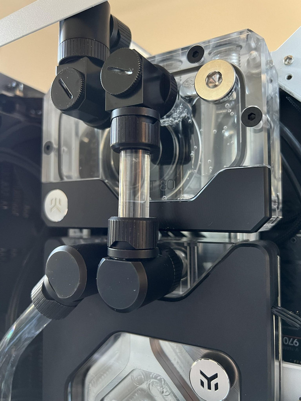 Close up of EKWB FLT80 and 3090FE water block and EKWB 90 degree fittings