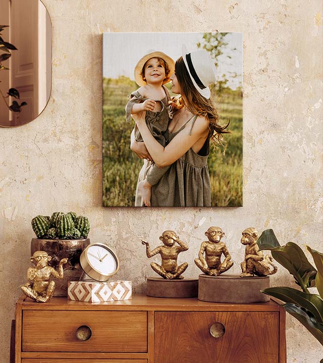 canvas print of a mom and child out in nature in a room