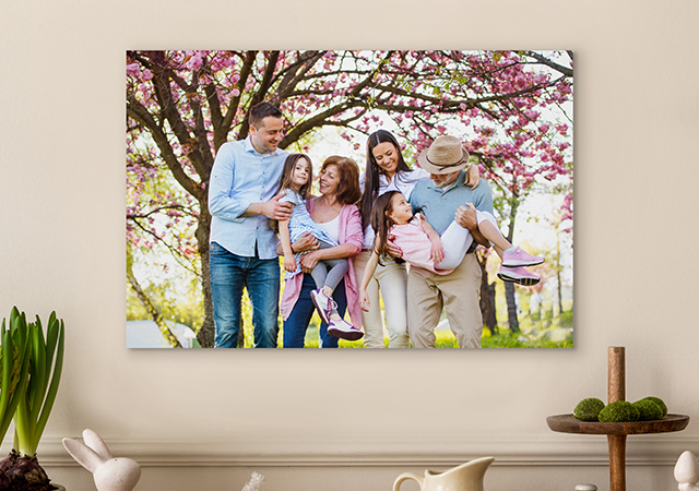 Canvas print of a family in front of flowered tree