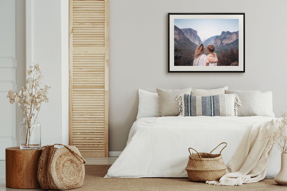 Framed print hung above the bed