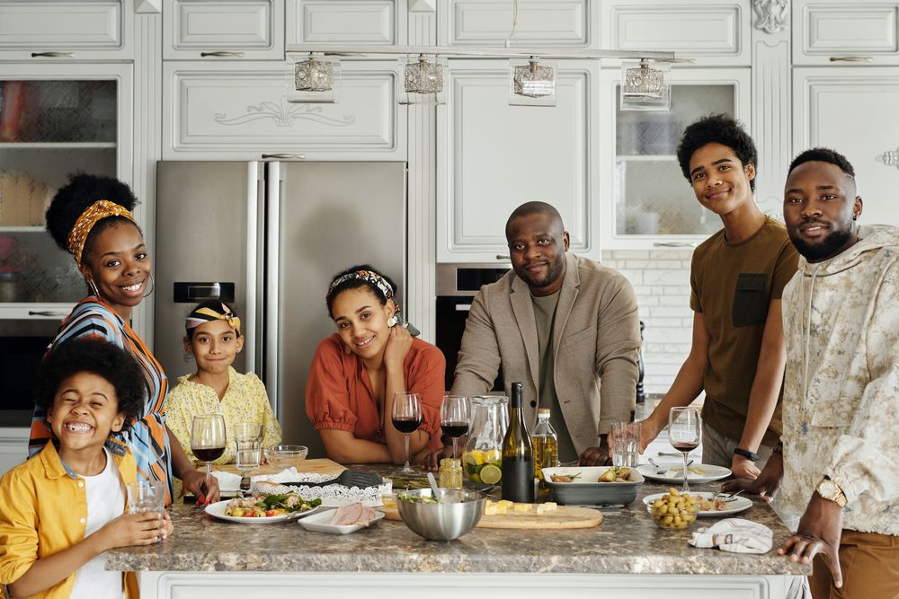 Family enjoying dinner around the table