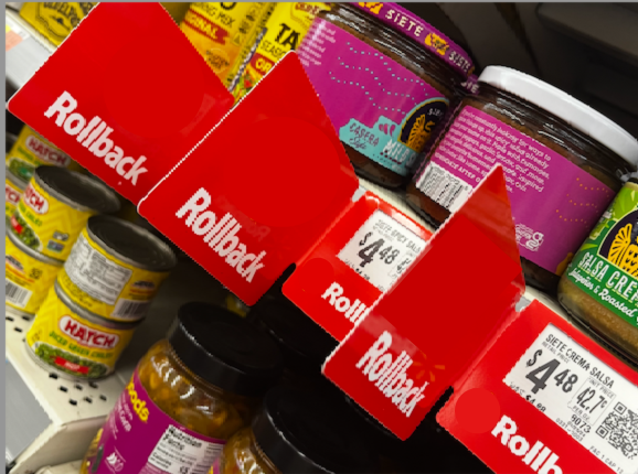 a rollback is when Walmart cuts the price of an item for a set period. They can lastup to six months. The rollback tag often sticks out of the shelf as seen below, and is usually tagged with a red and yellowish label showing both the current and previous price of the product. 
