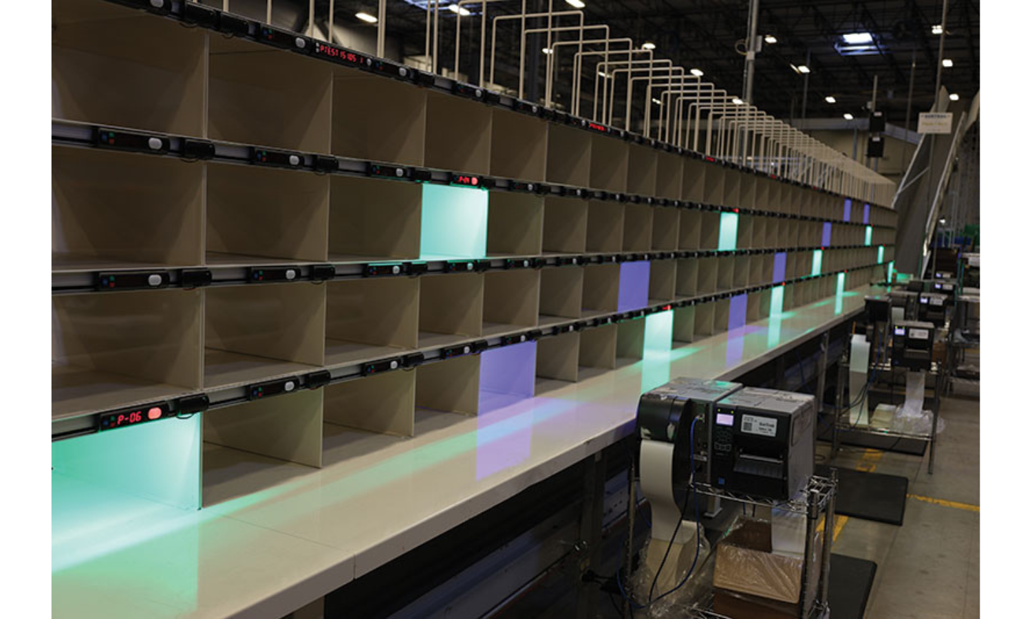 pick and pack put wall for order fulfillment and batch picking. Put wall has lighted cubbies so workers can place items in the cubby to fulfill an entire order. 