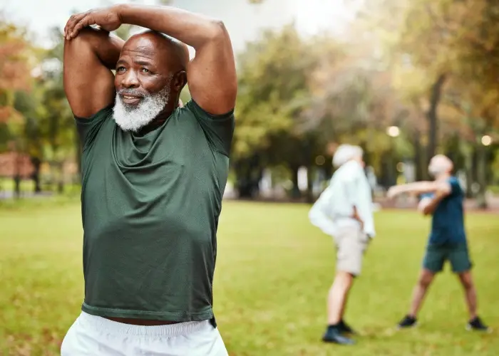 Man stretching and exercising.