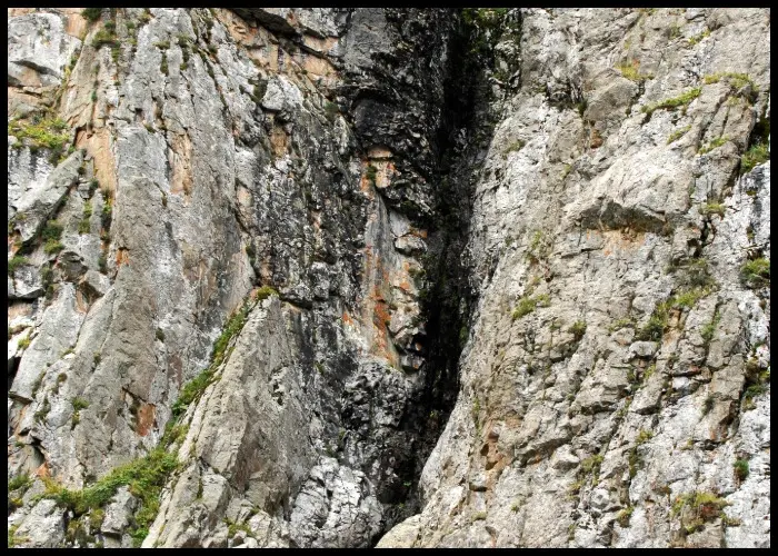 Shilajit resin running down a mountain.