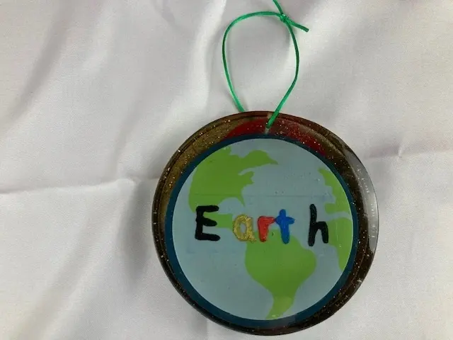 Art in the Earth Hanging Plaque