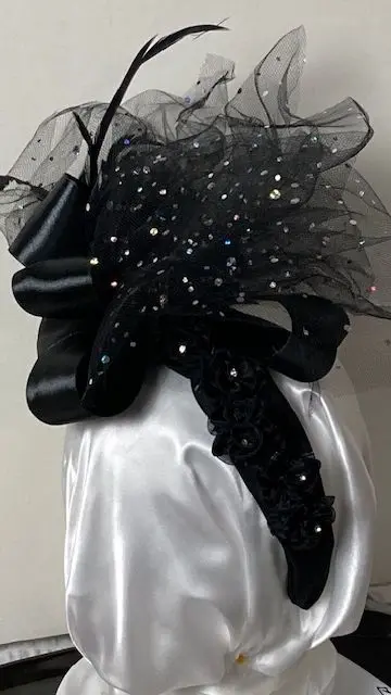 Black bow with wispy sparkle