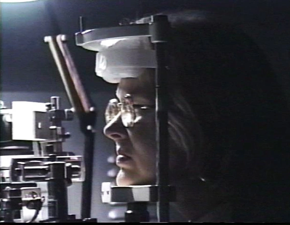 Elizabeth Goldring using her seeing machine. Black and white photo.