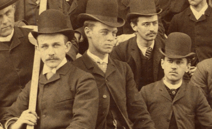 Sepia historical photo of four ment from MITs early graduating classes