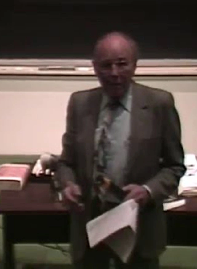 A trapese artist flying through the air, strobe photography image.